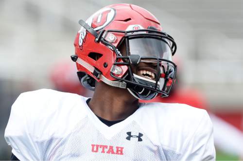 Steve Griffin  |  The Salt Lake Tribune


Utah freshman quarterback Tyler Huntley laughs during spring football practice at Rice-Eccles Stadium in Salt Lake City, Tuesday, March 29, 2016. Huntley and Simpkins both attended Hallandale High School in Florida.