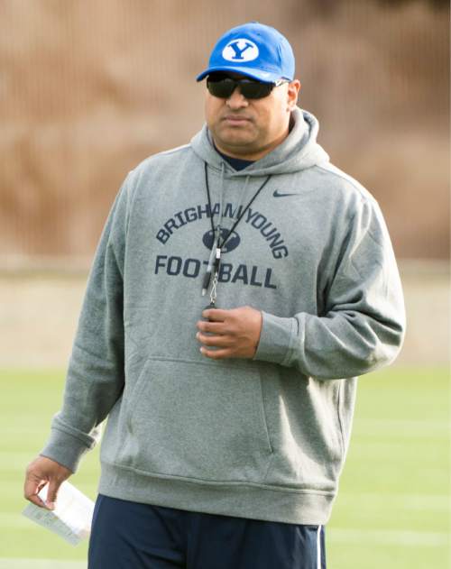 Rick Egan  |  The Salt Lake Tribune

BYU head coach Kalani Sitake watches the Cougars practice on the second day of spring practice, in Provo, Thursday, March 3, 2016.