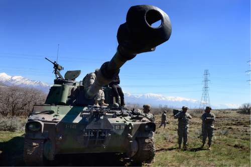 Scott Sommerdorf   |  The Salt Lake Tribune  
Utah National Guard's 65th Field Artillery Brigade, "America's Thunder," was scheduled to conduct artillery training with its two in-state Paladin battalions March 31 - April 3 at Camp Williams, Saturday, April 2, 2016.