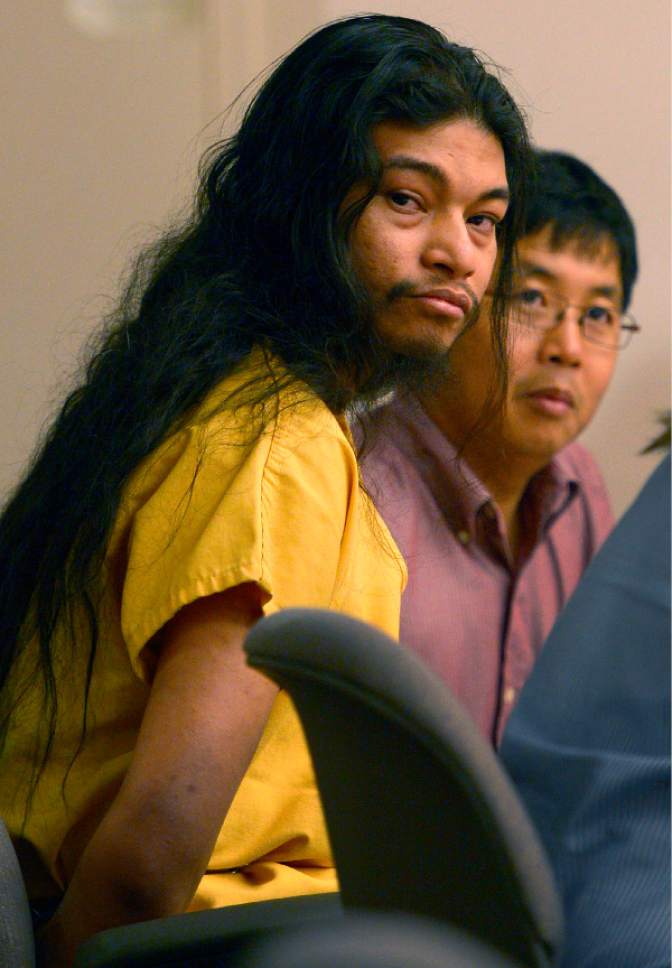 Leah Hogsten  |  The Salt Lake Tribune

Esar Met, a 27-year-old Burmese refugee looks at his victim's family during his sentencing hearing. Met was sentenced to life without the possibility of parole on Wednesday, May 14, 2014 by 3rd District Judge Judith Atherton for killing a 7-year-old neighbor girl at his South Salt Lake apartment in 2008. Met continued to maintain his innocence during the hearing.