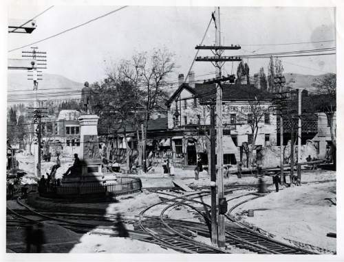 Tribune file photo

Trolley lines are put in around the Brigham Young statue on Main Street in this undated photo.