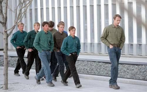Al Hartmann  |  The Salt Lake Tribune 
FLDS men and women march together to Lyle Jeffs' detention status hearing Wednesday April 6 at the Federal Courthouse in Salt Lake City.