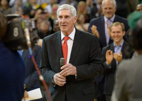 Scott Sommerdorf   |  The Salt Lake Tribune
Former Jazz coach Jerry Sloan takes in the crowd's applause as he is honored at halftime of the Utah Jazz vs Golden State Warriors game, Friday, Jan. 31, 2014.