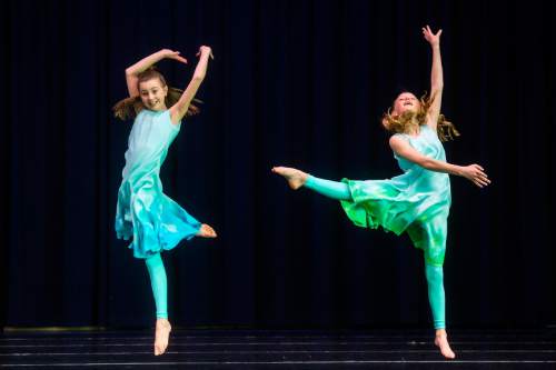 Chris Detrick  |  The Salt Lake Tribune
Sophia Wakefield and Gracie Dallimore pose during a rehearsal for Tanner Dance Children's Dance Theatre's performance of "Gwinna"at the University of Utah Tanner Dance Program on Tuesday, March 29, 2016. "Gwinna" will premiere at the Capitol Theatre in Salt Lake City on April 8 and 9. "Gwinna" is based on Barbara Helen Berger's book and brought into motion by the young artists of the University of Utah Children's Dance Theatre.
