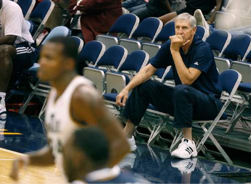 Scott Sommerdorf  l  The Salt Lake Tribune

Jazz head coach Jerry Sloan watches his team during a public scrimmage at Energy Solutions Arena, Saturday October 2, 2010.