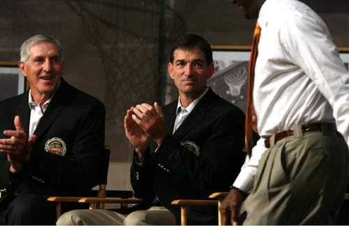 |  Tribune file photo

Jerry Sloan, left, and John Stockton applaud Michael Jordan during the Hall of Fame press conference in 2009.