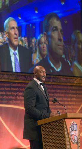 |  Tribune file photo

With images of Coach Jerry Sloan and John Stockton above him Karl Malone speaks as he is inducted into the Naismith Memorial Basketball of Fame in Springfield Massachussetts in 2010.