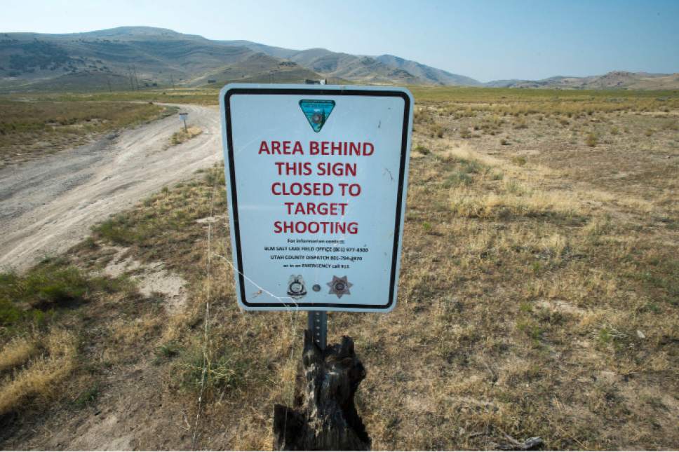 Steve Griffin  |  The Salt Lake Tribune

Target shooters are impacting public land on the Lake View Mountains west of Utah Lake. BLM is now devising a new management plan and proposes giving land to the county to manage as a public shooting range. Here a sign marks an area closed to shooting south of Saratoga Springs, Utah Wednesday, August 19, 2015.  l