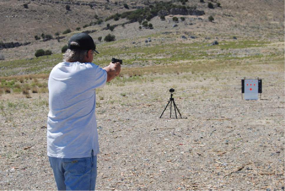 Brian Maffly  |  The Salt Lake Tribune 

A man, who identified himself as Tony, takes aim at paper targets with a 9mm handgun on public lands west of Utah Lake. The Bureau of Land Management has initiated a public process to revise a management plan on a 9,000-acre area on the Lake Mountains to help curb impacts associated with target shooting, including dumping, damage to ancient rock art, wildland fire, and threats to public safety. Stray bullets are known to have crossed State Route 68 and to have struck cows and a residence.