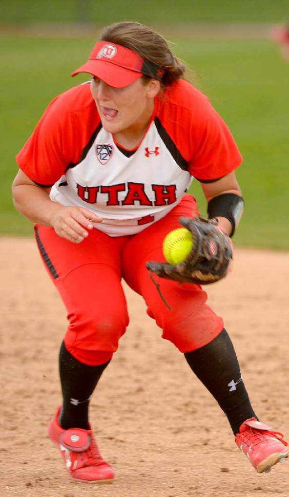 Leah Hogsten  |  The Salt Lake Tribune
Utah's Hannah Flippen throws to first for the out. University of Utah women's softball team defeated Southern Utah University 12-4 during their first game of a doubleheader, Tuesday, April 22, 2014.