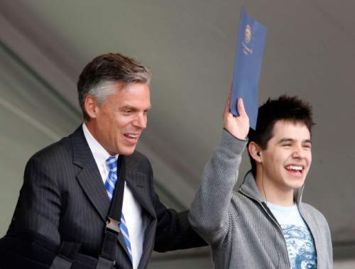 Steve Griffin  |  The Salt Lake Tribune 

In this file photo, "American Idol" star David Archuleta holds up a proclamation given to him by Utah Governor Jon Huntsman Jr., left, naming May 9th as "David Archuleta Day" in Utah during Archuleta's visit to Murray High School on  Friday, May 9, 2008.