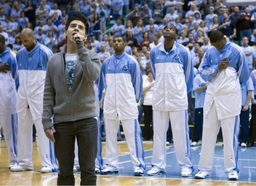Jeremy Harmon  |  The Salt Lake Tribune

American Idol star David Archuleta gets ready to sing the national anthem prior to game three of the second round of the NBA playoffs between the Utah Jazz and the L.A. Lakers at EnergySolutions Arena in Salt Lake City on Friday, May 2, 2008.