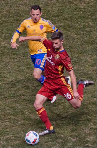 Michael Mangum  |  Special to the Tribune

Real Salt Lake defender Chris Wingert (16) clears the ball forward in front of Colorado Rapids midfielder Marco Pappa (10) during the first half their match at Rio Tinto Stadium in Sandy, UT on Saturday, April 9, 2016.
