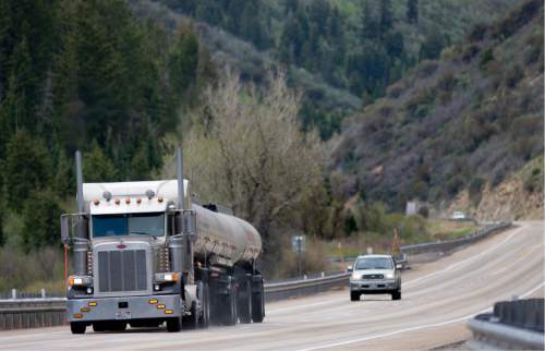 Kim Raff | The Salt Lake Tribune
An oil tanker uses US-40 to travel from the oil fields in the Uintah Basin to the refineries in North Salt Lake near Daniel's Summit in Utah on May 18, 2012.  More tankers are expected to be using US-40 in coming years, increasing wear & tear and creating some safety concerns.