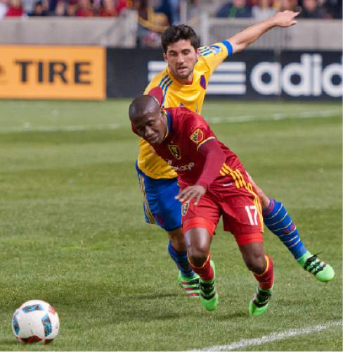 Michael Mangum  |  Special to the Tribune

Real Salt Lake defender Demar Phillips (17) is fouled by Colorado Rapids defender Eric Miller (3) on a breakaway during the second half their match at Rio Tinto Stadium in Sandy, UT on Saturday, April 9, 2016. RSL won 1-0.