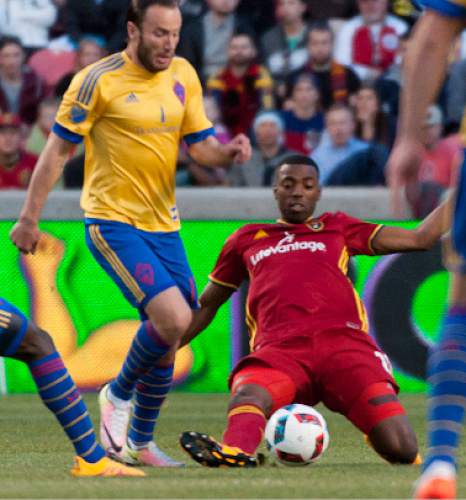 Michael Mangum  |  Special to the Tribune

Real Salt Lake defender Aaron Maund (21) tackles the ball away from Colorado Rapids forward Shkelzen Gashi (11) during the first half their match at Rio Tinto Stadium in Sandy, UT on Saturday, April 9, 2016.