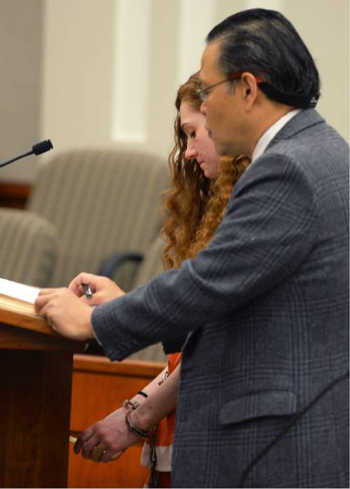 Steve Griffin  |  The Salt Lake Tribune


Jasmine Bridgeman, who pleaded guilty to obstructing justice in the beating death of her 2-year-old son J.J. Sieger, stands with her attorney Ronald Fujino in Judge John R. Morris' courtroom for sentencing at the Davis Justice Center in Farmington, Monday, April 11, 2016.