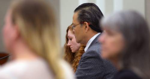 Steve Griffin  |  The Salt Lake Tribune


Jasmine Bridgeman, who pleaded guilty to obstructing justice in the beating death of her 2-year-old son J.J. Sieger, stands with her attorney Ronald Fujino in Judge John R. Morris' courtroom for sentencing at the Davis Justice Center in Farmington, Monday, April 11, 2016.