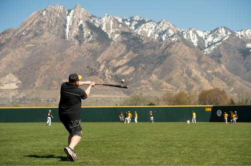Rick Egan  |  The Salt Lake Tribune

Assistant baseball coach Chris Shelton hits fly balls to the outfielders during practice at Cottonwood, where he played. Ten years ago, he became a Major League Baseball phenomenon by hitting nine home runs in 17 games in April for Detroit. Wednesday, April 6, 2016.