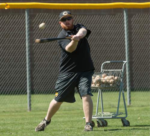 Rick Egan  |  The Salt Lake Tribune

Assistant baseball coach Chris Shelton hits fly balls to the outfielders during practice at Cottonwood, where he played. Ten years ago, he became a Major League Baseball phenomenon by hitting nine home runs in 17 games in April for Detroit. Wednesday, April 6, 2016.