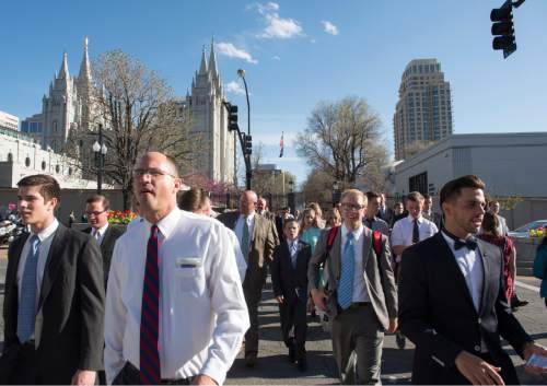 Rick Egan  |  The Salt Lake Tribune

LDS faithful walk to the LDS Conference Center for the185th Annual LDS General Conference Priesthood Session, Saturday, April 4, 2015.