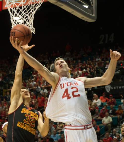 Rick Egan  |  The Salt Lake Tribune

USC Trojans forward Nikola Jovanovic (32) grabs the jersey as he tries to stop Utah Utes forward Jakob Poeltl (42) from scoring, in PAC-12 Basketball Championship action, as Utah defeated USC Trojans 80-72, at the MGM Arena, in Las Vegas, Thursday, March 10, 2016.