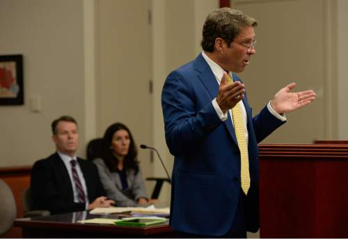 Francisco Kjolseth | The Salt Lake Tribune
John Swallow, left, listens as his defense attorney Scott C. Williams, asks the judge to order the Salt Lake County district attorney to seek additional evidence from the FBI, during an appearance at the Matheson Courthouse on Tuesday, April 12, 2016.
