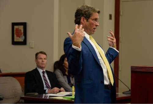 Francisco Kjolseth | The Salt Lake Tribune
John Swallow, left, listens as his defense attorney Scott C. Williams, asks the judge to order the Salt Lake County district attorney to seek additional evidence from the FBI, during an appearance at the Matheson Courthouse on Tuesday, April 12, 2016.