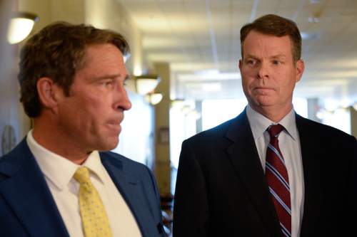 Francisco Kjolseth | The Salt Lake Tribune
Defense attorney Scott C. Williams, left, speaks to the media alongside his client John Swallow following a hearing at the Matheson courthouse on Tuesday, April 12, 2016. Williams was asking the judge to order the Salt Lake County district attorney to seek additional evidence from the FBI.
