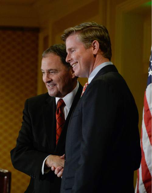 Francisco Kjolseth | The Salt Lake Tribune
Republican candidates for Utah governor, Governor Gary Herbert, left, and Jonathan Johnson, pose for photographs following the first fledged debate at the Little America Hotel in Salt Lake City on Monday, April 11, 2016.