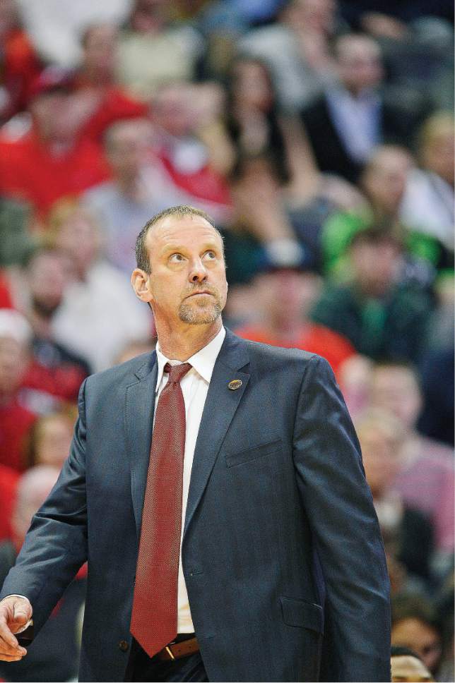 Scott Sommerdorf   |  The Salt Lake Tribune  
Utah Utes head coach Larry Krystkowiak glances at the scoreboard late in the second half after Utah took back the momentum and the lead. Utah beat Fresno State 80-69 in Denver, Thursday, March 17, 2016.