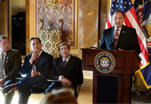 Scott Sommerdorf  |  The Salt Lake Tribune
Utah Governor Gary Herbert speaks during the press conference in which Utah's Criminal and Juvenile Justice Commission released a package of proposals aimed at reducing the population and costs of the state's prison system, Wednesday, November 12, 2014. At left are; Representative Eric Hutchings, R-Kearns, Attorney General Sean Reyes, and Chief Justice Matthew Durrant.