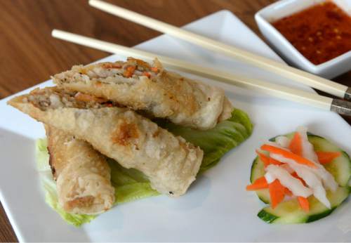 Al Hartmann  |  The Salt Lake Tribune
SOMI Vietnamese Bistro in Salt Lake City features high-quality Asian-fusion cuisine, with an emphasis on Vietnamese flavors, in a trendy new uprising in Sugar House. Pictured, Crispy Spring Rolls Cha Cio made with ground pork, onions, mushrooms, taro, carrots, with dipping sauce.
