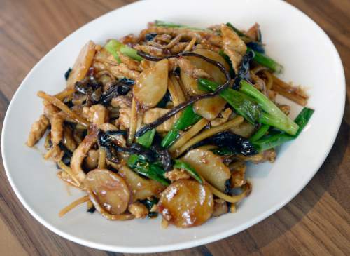 Al Hartmann  |  The Salt Lake Tribune
SOMI Vietnamese Bistro in Salt Lake City features high-quality Asian-fusion cuisine, with an emphasis on Vietnamese flavors, in a trendy new uprising in Sugar House. Pictured, Garlic Pork, with stir-fried pork, wood ear mushroom, water chestnuts and spicy garlic sauce.