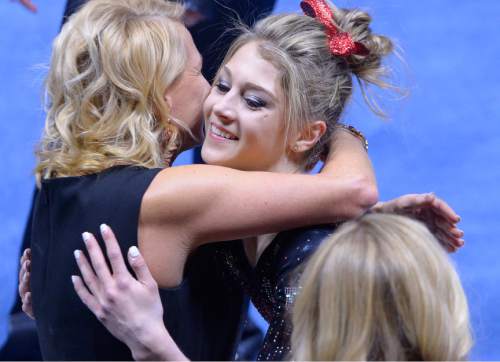 Leah Hogsten  |  The Salt Lake Tribune
Utah's Sabrina Schwab is hugged by coach Megan Marsden after she took first place in floor exercise with a score of 9.925. University of Utah No. 6 gymnasts defeated  No. 11 Oregon State during their Pac-12 meet in Salt Lake City, January 23, 2016.