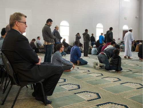 Rick Egan  |  The Salt Lake Tribune

U.S. Attorney for Utah John Huber  (left) visits the Khadeeja Islamic Center during Friday prayers, Friday, April 15, 2016.