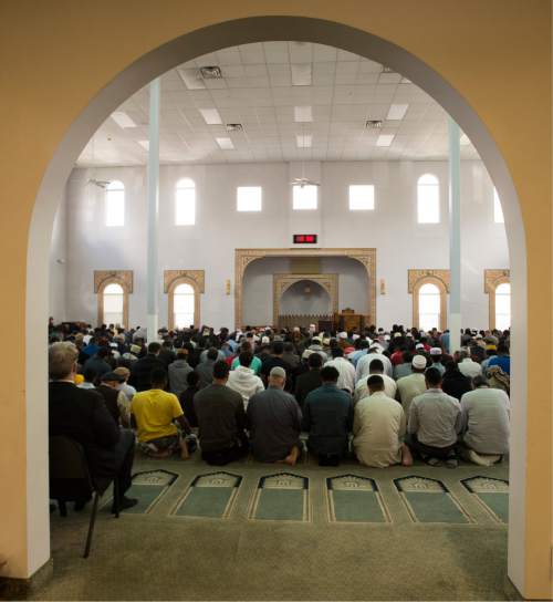 Rick Egan  |  The Salt Lake Tribune

U.S. Attorney for Utah John Huber (left) visits the Khadeeja Islamic Center during Friday prayers, Friday, April 15, 2016.