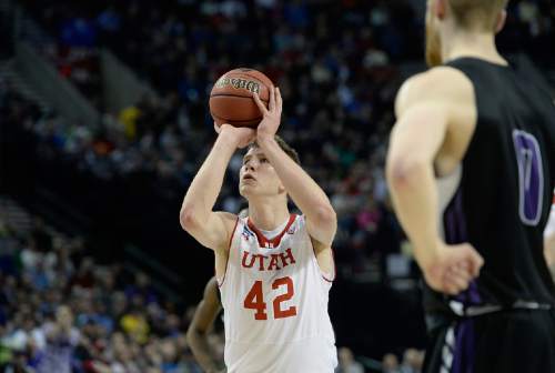 Scott Sommerdorf   |  The Salt Lake Tribune
Utah forward Jakob Poeltl (42) made some key free throws late in the game to maintain the lead. Utah defeated Stephen F. Austin 57-50 at the Moda Center in Portland, Thursday, March 19, 2015.