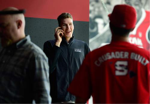 Scott Sommerdorf   |  The Salt Lake Tribune  
Jakob Poeltl takes a call to do an interview after he announced that he's decided to enter the NBA Draft. Utah head coach Larry Krystkowiak joined him in the press conference at the Utah practice facility, Wednesday, April 13, 2016.