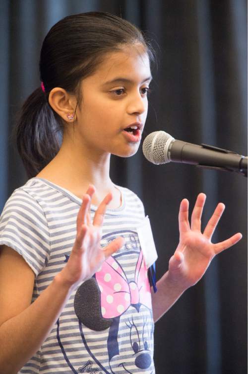 Rick Egan  |  The Salt Lake Tribune
Youth storyteller, Aaboli P. Samant  tells a story at the first Story Crossroads Festival, in West Jordan, at the Viridian Event Center on Saturday.