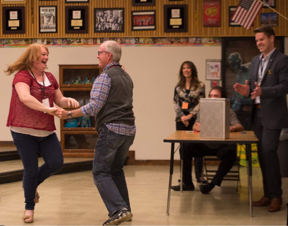 Leah Hogsten  |  The Salt Lake Tribune
Salt Lake County delegates and poll watchers Chalese Craig and Kent Winder had an impromptu swing dance while waiting for Utah House district 30 volunteers to begin counting ballots between incumbent Fred Cox and newcomer former West Valley Mayor Mike Winder at the Salt Lake County Republican Convention, Saturday, April 16, 2016 at Cottonwood High School.