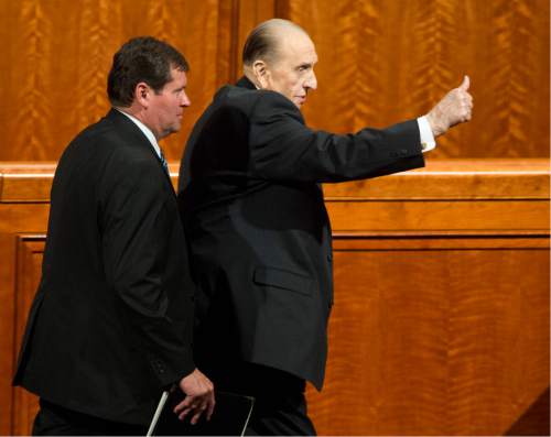 Rick Egan  |  The Salt Lake Tribune

President Thomas S. Monson gives a thumbs-up to the crowd, as he leaves the185th Annual LDS General Conference Priesthood Session, Saturday, April 4, 2015.