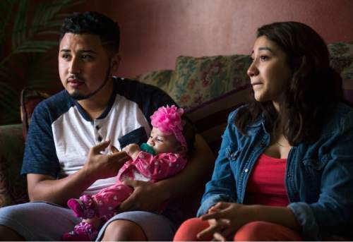 Steve Griffin  |  The Salt Lake Tribune


Granger High School soccer player Carlos Tavares, his girlfriend, Marilin Marin, and their daughter Abigail, who are currently living with Marilin's  parents in West Valley City, talk about their young life together Wednesday, April 6, 2016.