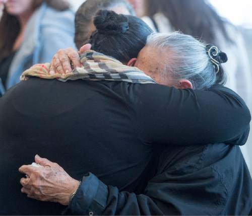 Rick Egan  |  The Salt Lake Tribune

Relatives embrace outside the courtroom after the sentencing of Nitokalisi Niki Fonua .Fonua pleaded guilty to fatally shooting  21-year-old Krystal Flores, and for the shooting death of 34-year-old Vilami Latu. Monday, April 18, 2016.