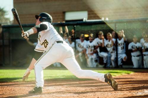 Chris Detrick  |  The Salt Lake Tribune
Cottonwood's Cam Daley (28) hits an RBI during the game at Cottonwood High School Tuesday April 12, 2016. Cottonwood defeated Bingham 4-1.
