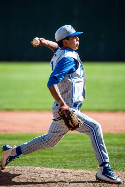 Chris Detrick  |  The Salt Lake Tribune
Bingham's Harley Yazzie (12) pitches during the game at Cottonwood High School Tuesday April 12, 2016. Cottonwood defeated Bingham 4-1.