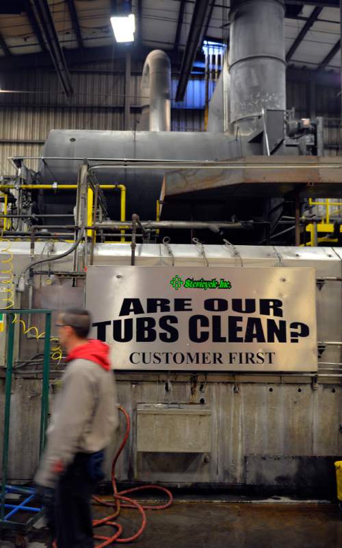 Keith Johnson  |  Tribune file photo
The primary incinerator can be seen in January 2014 above a piece of machinery used to sterilize biohazard containers at Stericycle, a hazardous medical waste disposal company in North Salt Lake City.