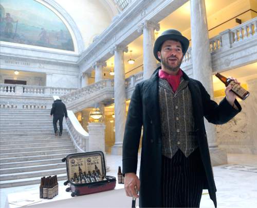 Al Hartmann  |  The Salt Lake Tribune
Actor for Western Values Project, portraying a snake oil salesman, mocks Rep. Ken Ivory, and Congressman Rob Bishop at the Capitol before the 9 a.m. meeting of the Commission for the Stewardship of Public Lands where a resolution condeming the Antiquities Act was expected to pass.  Also in contention as part of the Antiquities Act is a proposal before President Obama setting aside hundreds of thousands of acres in San Juan County for a Bear's Ears National Monument.