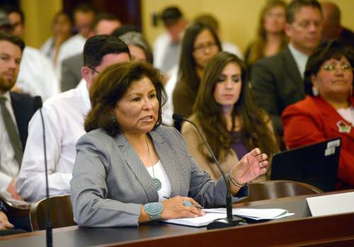 Al Hartmann  |  The Salt Lake Tribune
San Juan County County Commissioner Rebecca Benally, a Navajo tribal member, urges the Commission for the Stewardship of Public Lands to pass the Antiquities Act resolution.  She went on record that a Bear's Ears National Monument would be devestating to San Juan County which already has five monuments.