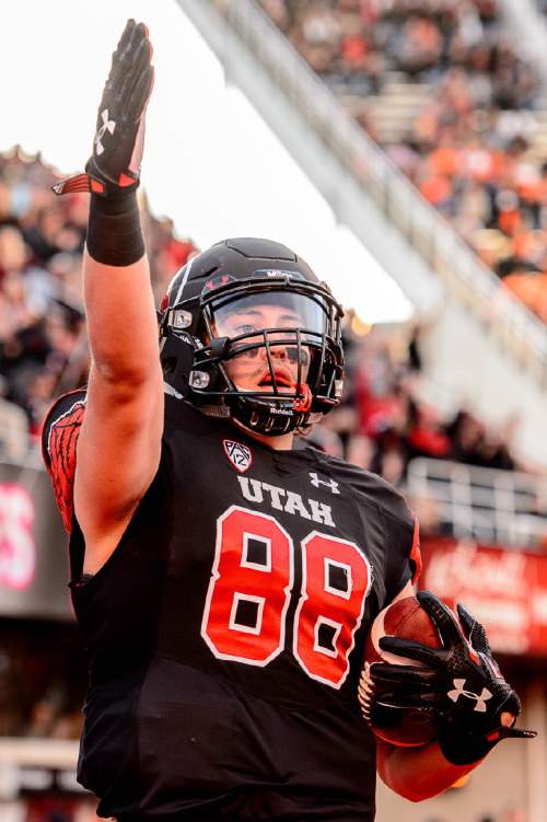 Trent Nelson  |  The Salt Lake Tribune
Utah Utes tight end Harrison Handley (88) dives into the end zone for a first quarter touchdown as the University of Utah hosts Oregon State, NCAA football at Rice-Eccles Stadium in Salt Lake City, Saturday October 31, 2015.